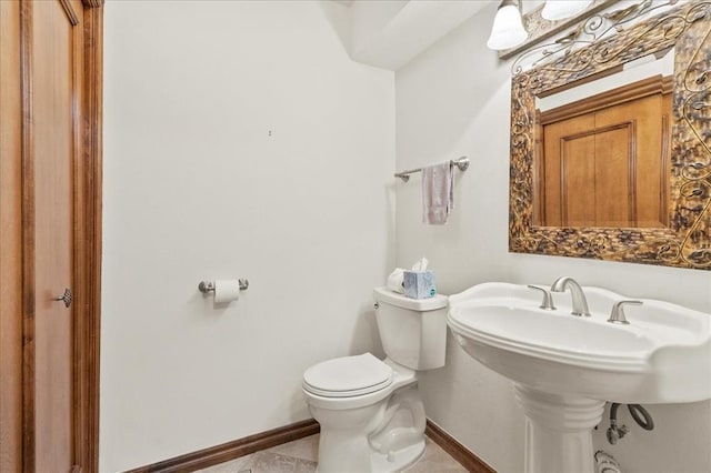 5839 Hefner Village Ct, Oklahoma City, OK 73162 - half bathroom with toilet and baseboards