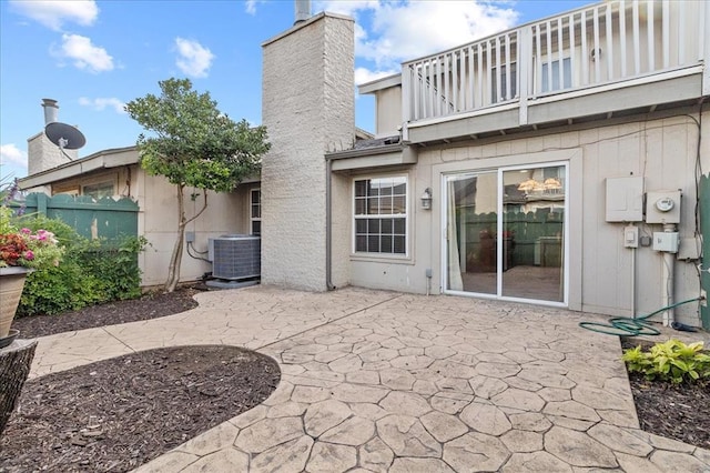 5839 Hefner Village Ct, Oklahoma City, OK 73162 - view of patio featuring central AC unit and a balcony