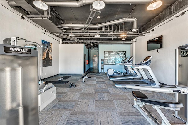 exercise room with carpet floors