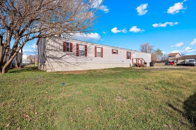 220 N Vernon Ave, Hinton, OK 73047 - manufactured / mobile home featuring a front yard
