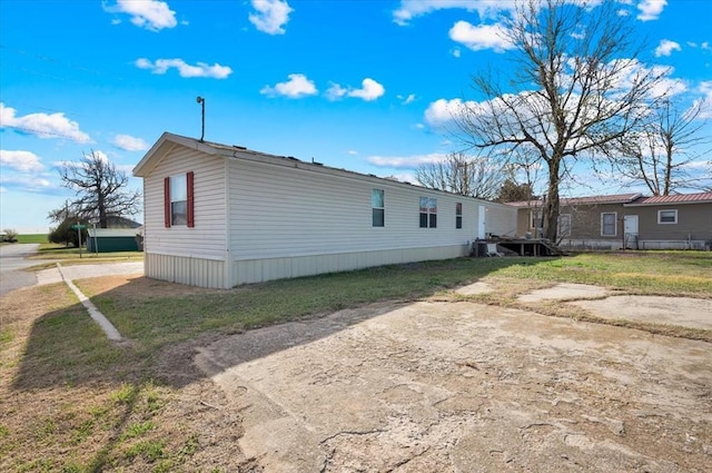 220 N Vernon Ave, Hinton, OK 73047 - rear view of property featuring driveway