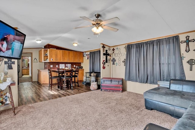 220 N Vernon Ave, Hinton, OK 73047 - living area featuring carpet floors, ceiling fan, and vaulted ceiling