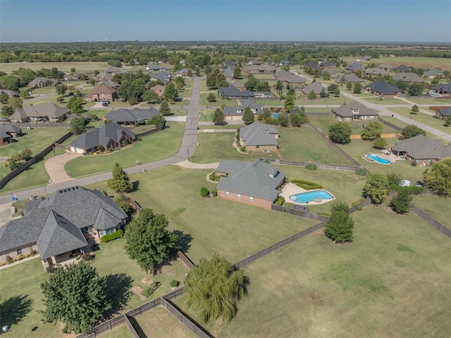 239 Brandon Cir, Goldsby, OK 73093 - aerial view of property and surrounding area featuring a pool area and nearby suburban area