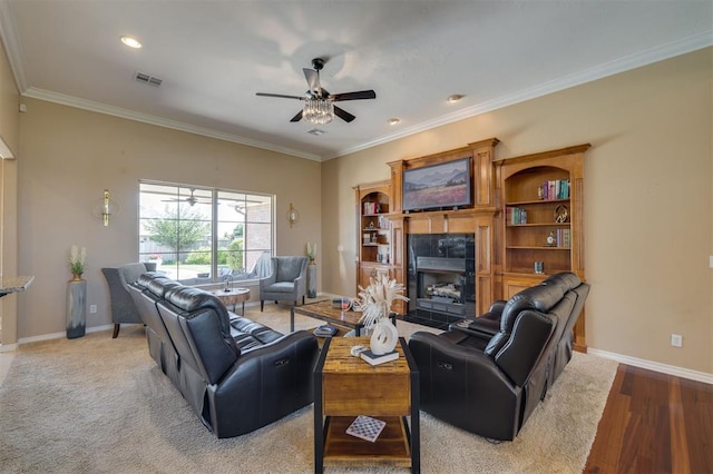 239 Brandon Cir, Goldsby, OK 73093 - living area with ceiling fan, a fireplace, baseboards, ornamental molding, and recessed lighting