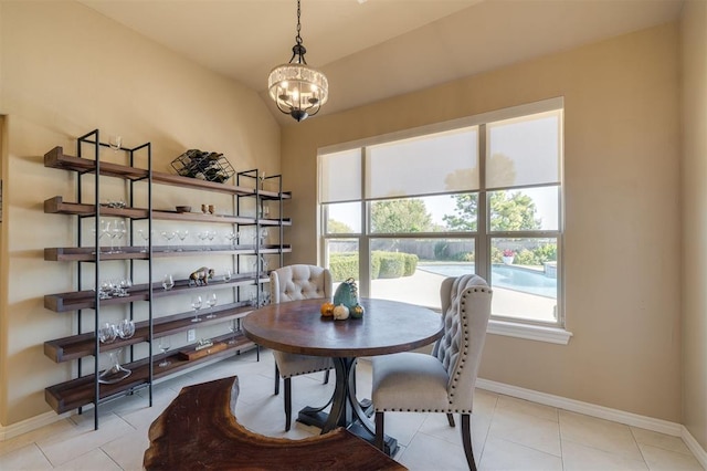 239 Brandon Cir, Goldsby, OK 73093 - dining space featuring a chandelier, baseboards, and light tile patterned floors