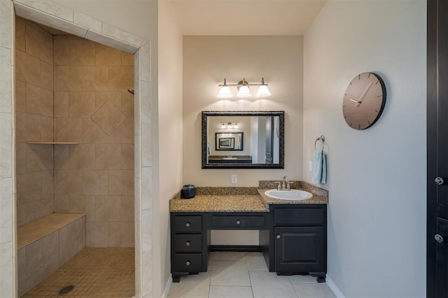 239 Brandon Cir, Goldsby, OK 73093 - full bathroom featuring tile patterned floors, vanity, a tile shower, and baseboards