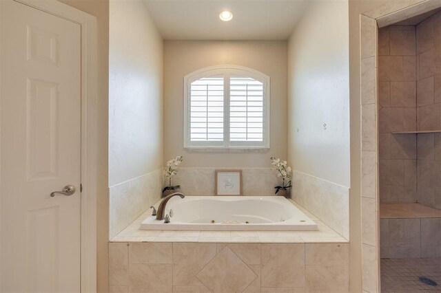 239 Brandon Cir, Goldsby, OK 73093 - full bathroom featuring a jetted tub, tiled shower, and recessed lighting