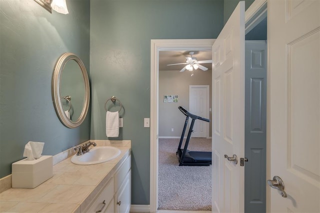 239 Brandon Cir, Goldsby, OK 73093 - bathroom featuring vanity, ceiling fan, and baseboards