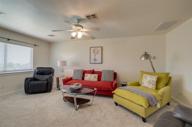 239 Brandon Cir, Goldsby, OK 73093 - carpeted living room featuring a ceiling fan and baseboards