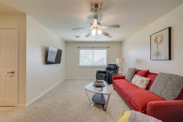 239 Brandon Cir, Goldsby, OK 73093 - carpeted living area with a ceiling fan and baseboards