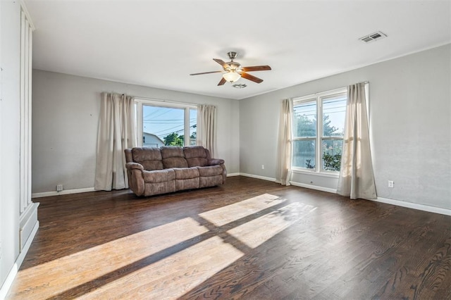 3701 NW 59th St, Oklahoma City, OK 73112 - living area featuring wood finished floors, ceiling fan, and baseboards