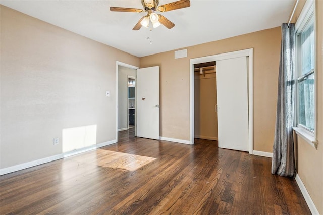 3701 NW 59th St, Oklahoma City, OK 73112 - unfurnished bedroom featuring wood finished floors, baseboards, a closet, and ceiling fan