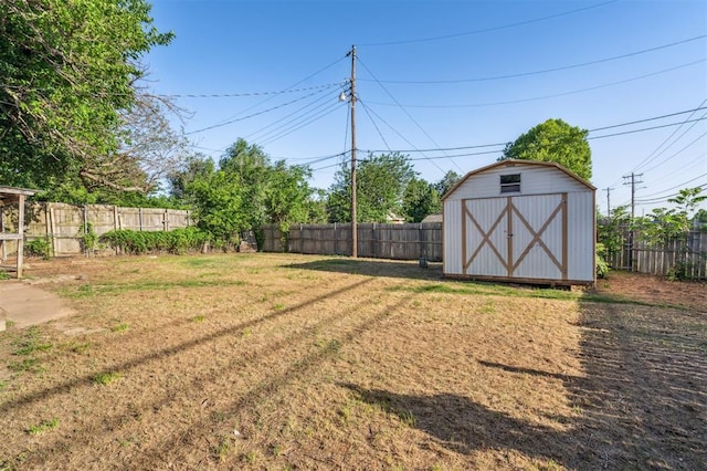 3701 NW 59th St, Oklahoma City, OK 73112 - view of yard featuring a storage shed and an outbuilding