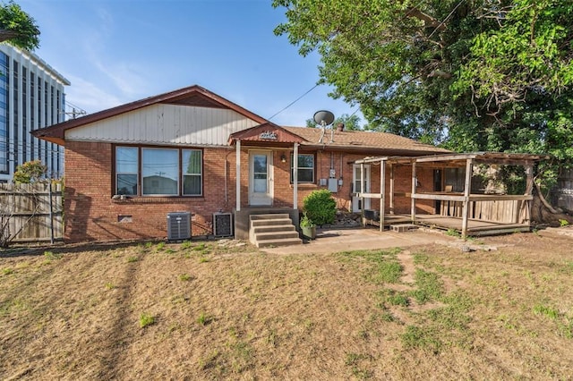 3701 NW 59th St, Oklahoma City, OK 73112 - ranch-style home featuring brick siding and central AC