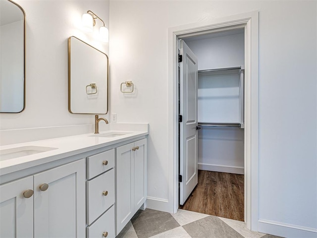 29612 Memory Ln, Norman, OK 73072 - full bathroom with double vanity and a walk in closet
