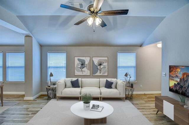 20101 Park Ln, Harrah, OK 73045 - living room with wood finished floors, vaulted ceiling, baseboards, and a ceiling fan