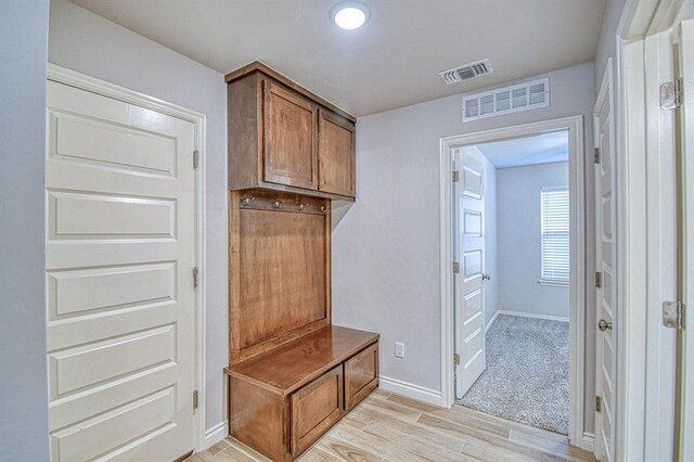 20101 Park Ln, Harrah, OK 73045 - mudroom featuring light wood finished floors and baseboards