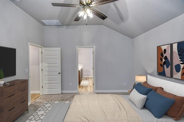 20101 Park Ln, Harrah, OK 73045 - bedroom with lofted ceiling, ensuite bathroom, ceiling fan, and baseboards