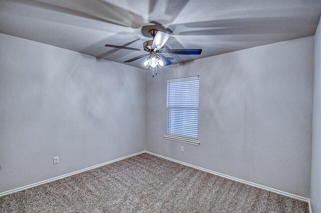 20101 Park Ln, Harrah, OK 73045 - spare room with carpet flooring, a ceiling fan, and baseboards