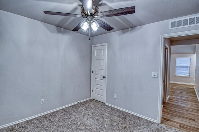 20101 Park Ln, Harrah, OK 73045 - carpeted empty room with a ceiling fan and baseboards