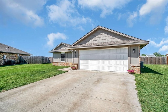 1537 Avalon Dr, Altus, OK 73521 - single story home with stone siding, a garage, concrete driveway, and cooling unit
