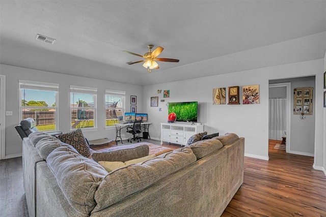 1537 Avalon Dr, Altus, OK 73521 - living room featuring ceiling fan, dark wood-style flooring, and baseboards