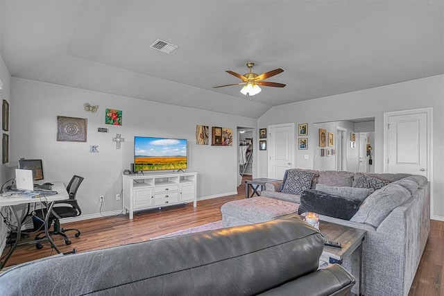 1537 Avalon Dr, Altus, OK 73521 - living room with wood finished floors, a ceiling fan, a desk, lofted ceiling, and baseboards