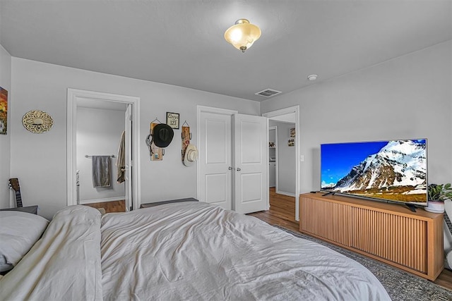 1537 Avalon Dr, Altus, OK 73521 - bedroom with wood finished floors and baseboards