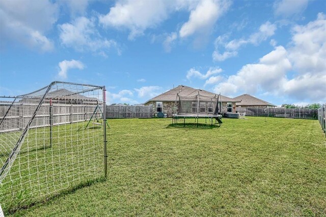1537 Avalon Dr, Altus, OK 73521 - view of yard featuring a trampoline
