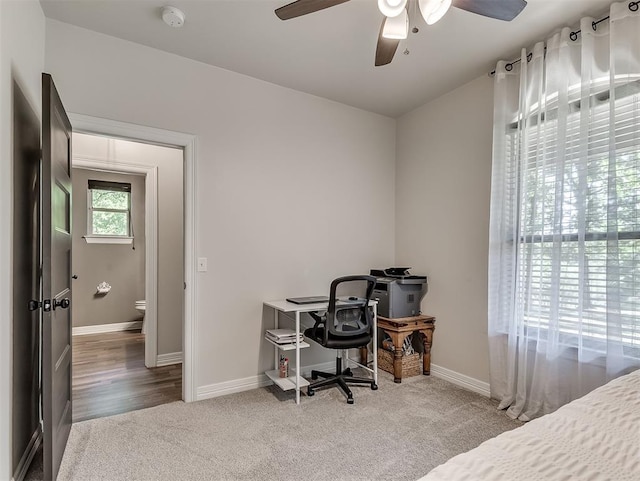 940437 S 3310th Rd, Wellston, OK 74881 - carpeted bedroom featuring a ceiling fan and an office area
