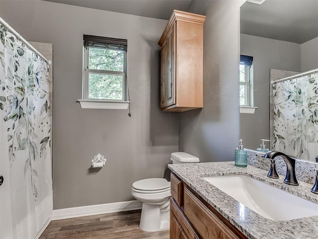 940437 S 3310th Rd, Wellston, OK 74881 - bathroom featuring vanity, wood finished floors, healthy amount of natural light, and a shower with curtain