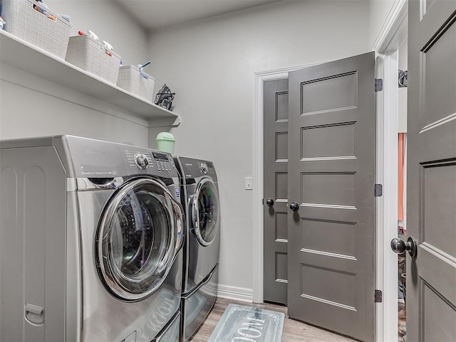 940437 S 3310th Rd, Wellston, OK 74881 - laundry room featuring independent washer and dryer and light wood-style flooring