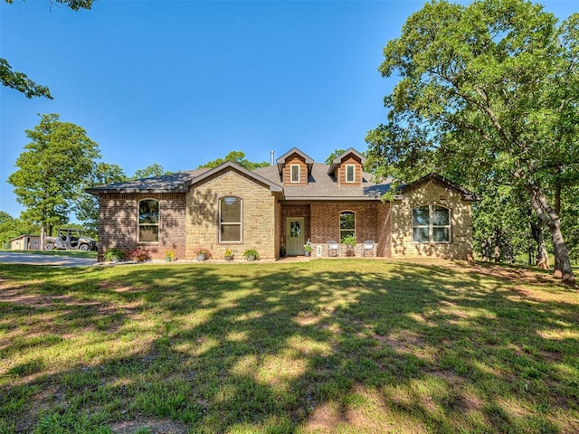 940437 S 3310th Rd, Wellston, OK 74881 - view of front of home featuring a front lawn and brick siding