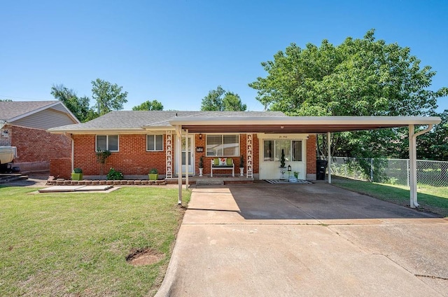640 SW 1st Pl, Moore, OK 73160 - view of front of house featuring brick siding, an attached carport, and a porch