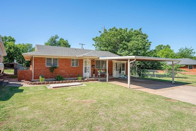 640 SW 1st Pl, Moore, OK 73160 - ranch-style home with brick siding and an attached carport