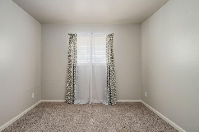 640 SW 1st Pl, Moore, OK 73160 - spare room with light carpet and baseboards