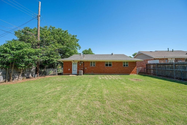 640 SW 1st Pl, Moore, OK 73160 - back of property with central air condition unit and brick siding