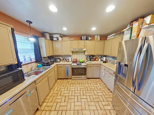 2317 County Road 1268, Blanchard, OK 73010 - kitchen featuring stainless steel appliances, a sink, under cabinet range hood, light countertops, and recessed lighting