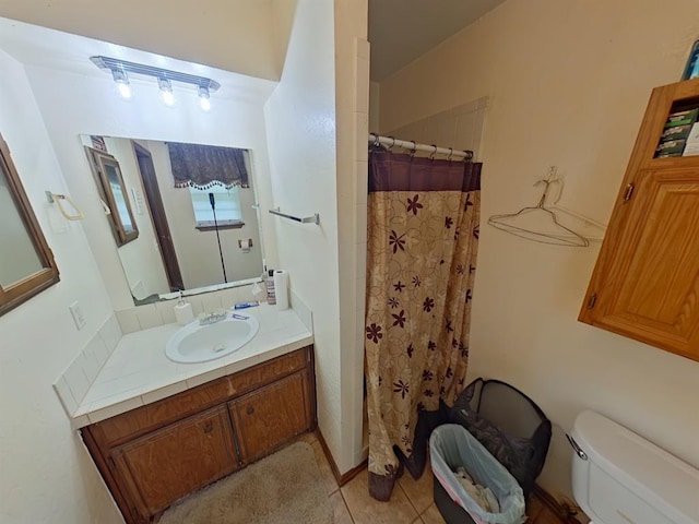 2317 County Road 1268, Blanchard, OK 73010 - full bathroom with toilet, vanity, a shower with curtain, and tile patterned floors