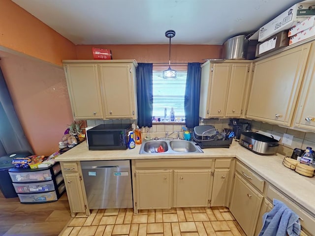 2317 County Road 1268, Blanchard, OK 73010 - kitchen with dishwasher, a sink, black microwave, light countertops, and backsplash