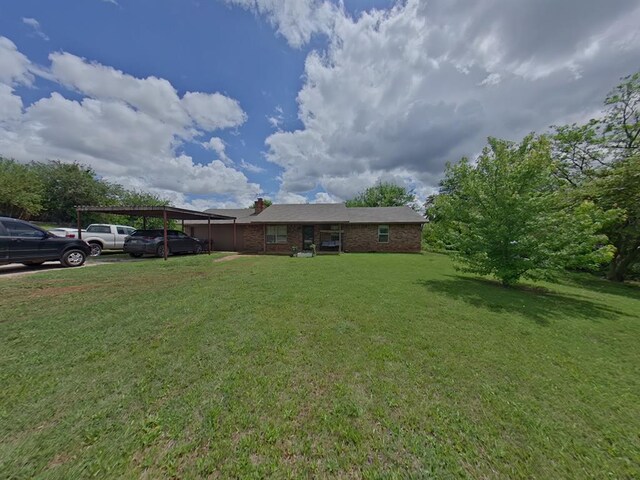 2317 County Road 1268, Blanchard, OK 73010 - view of grassy yard with a carport