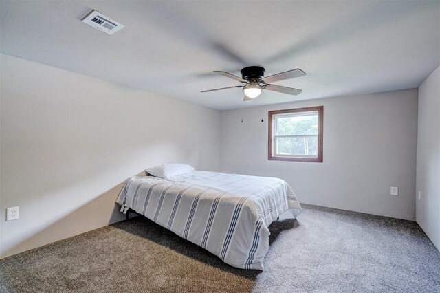 4575 Hidden Path, Kingston, OK 73439 - carpeted bedroom featuring a ceiling fan