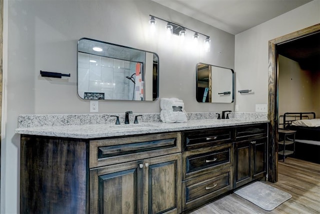 4575 Hidden Path, Kingston, OK 73439 - bathroom with wood finished floors and double vanity