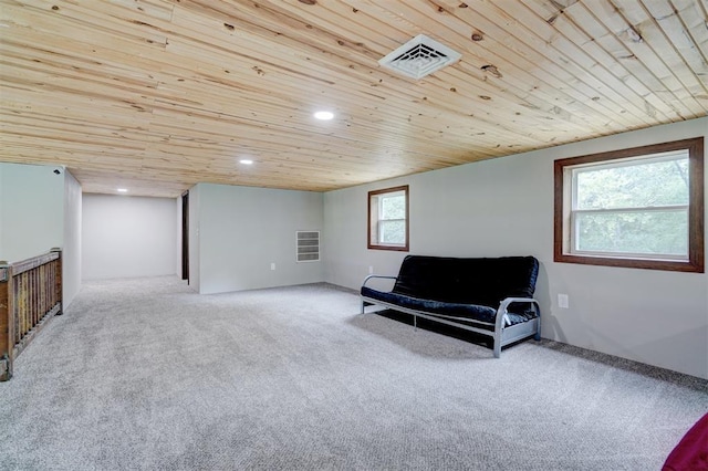 4575 Hidden Path, Kingston, OK 73439 - living area with wood ceiling, carpet flooring, and recessed lighting
