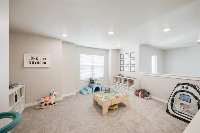 recreation room with carpet flooring, healthy amount of natural light, baseboards, and recessed lighting