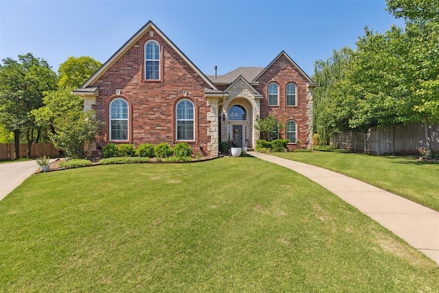 traditional-style home featuring brick siding