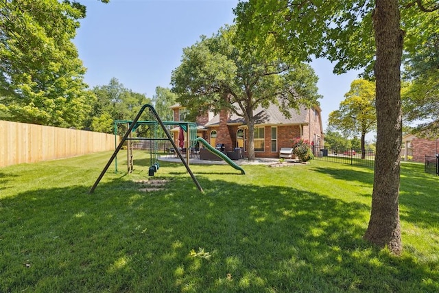 view of yard featuring a playground