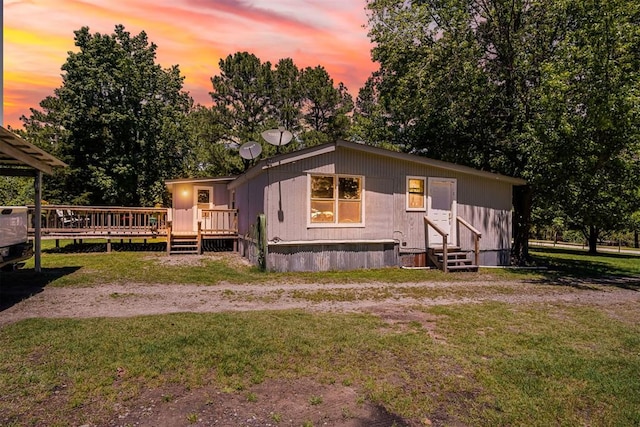 114166 S 4209th Rd, Eufaula, OK 74432 - manufactured / mobile home featuring a front yard, a wooden deck, and entry steps