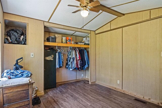 114166 S 4209th Rd, Eufaula, OK 74432 - bedroom featuring wood finished floors, wood walls, a closet, and baseboards