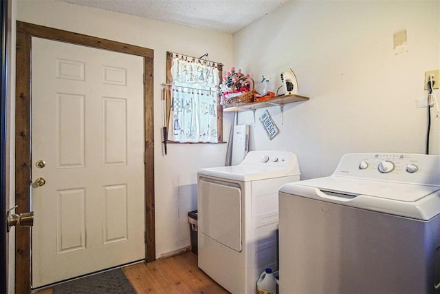 114166 S 4209th Rd, Eufaula, OK 74432 - washroom with washer and dryer, light wood-style floors, and a textured ceiling